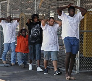 Inmates head back to their cells inside